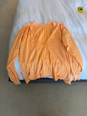 FP Movement by Free People Lightweight V-Neck Long Sleeve Top in Peach